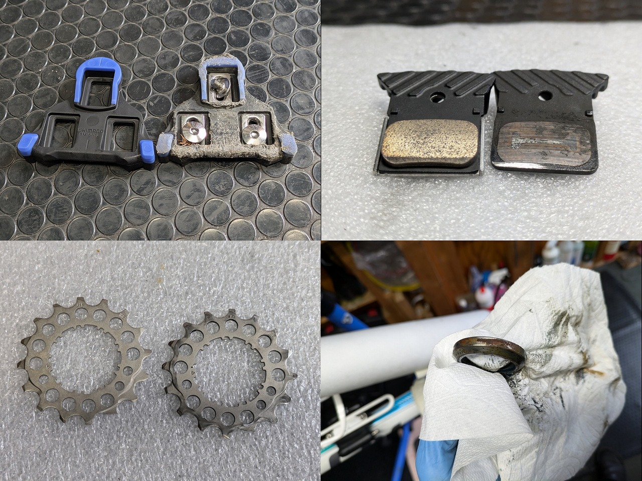 ロードバイクの摩耗したクリート、ブレーキパッド、スプロケット、ベアリングを並べた消耗品の比較画像